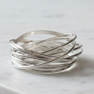 Womens High-Polished Silver-Plated Stainless Steel Interlocking Bangle Bracelet